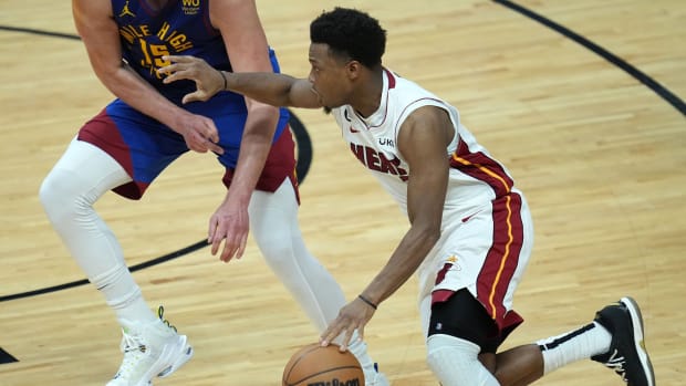Kyle Lowry won't debut for the 76ers just yet.